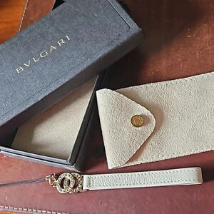 Bulgari leather bag charm with suede carrying pouch and gift box